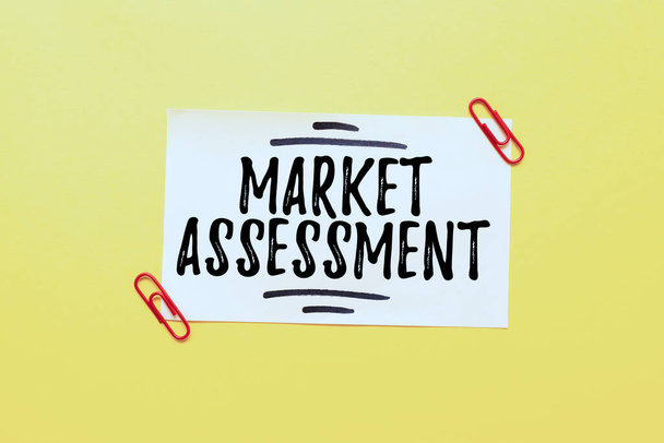 Writing displaying text Market Assessment. Business concept evaluation of the market for a product or service Critical Thinking Finding Clues Answering Questions Collecting Data - Photo, image