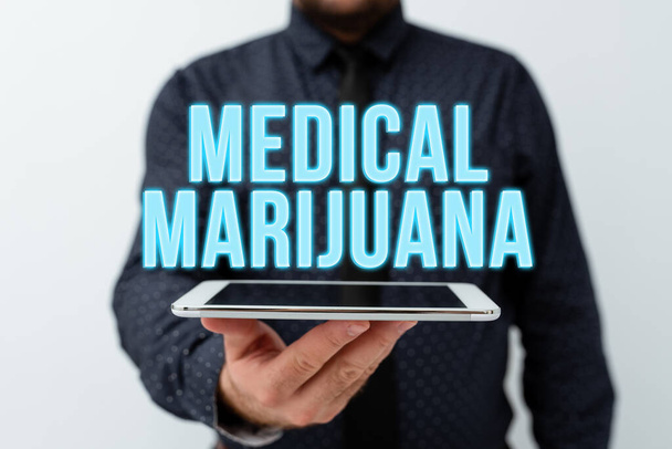 Text caption presenting Medical Marijuana. Business overview recommended by examining as treatment of a medical condition Presenting New Technology Ideas Discussing Technological Improvement - Photo, image
