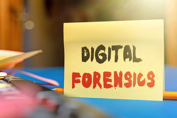 Sign displaying Digital Forensics. Business idea investigation of material found in digital devices Multiple Assorted Collection Office Stationery Photo Placed Over Table - Fotoğraf, Görsel