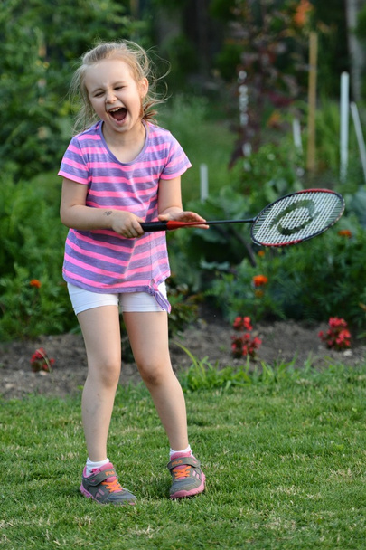 Cute little girl playing badminton - Fotografie, Obrázek
