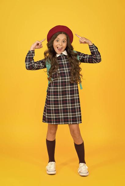 look at that. retro girl wear uniform and parisian beret. kid school fashion. happy child ready for schoolyear. education. knowledge day. happy childhood. french style concept. back to school - Фото, изображение