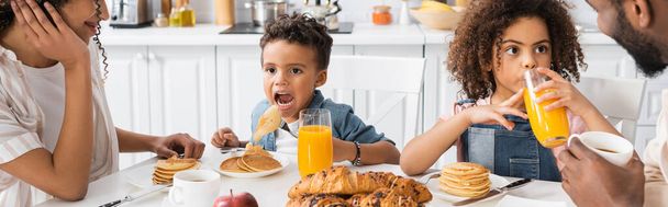african american kids having breakfast with parents in kitchen, banner - Fotoğraf, Görsel