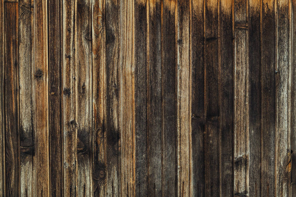 Weather worn rustic wooden wall texture as background, aged wood planks pattern - Photo, Image