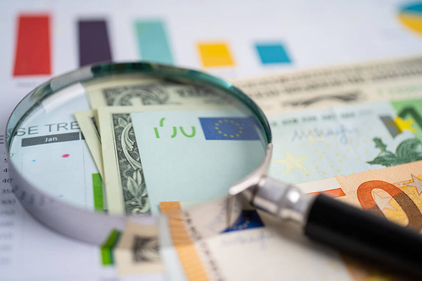 Magnifying glass on charts graphs paper. Financial development, Banking Account, Statistics, Investment Analytic research data economy, Stock exchange trading, Business office company meeting concept. - Fotoğraf, Görsel