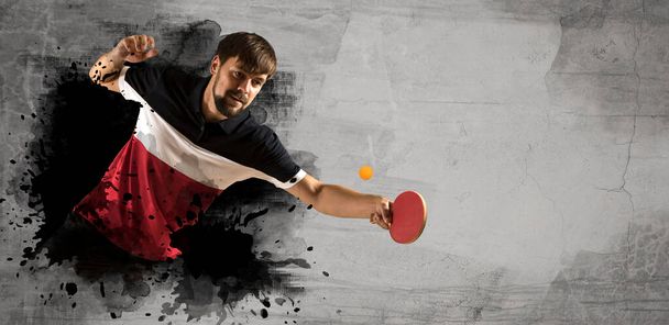 Man playing ping pong on wall background. Sport banner - Фото, изображение