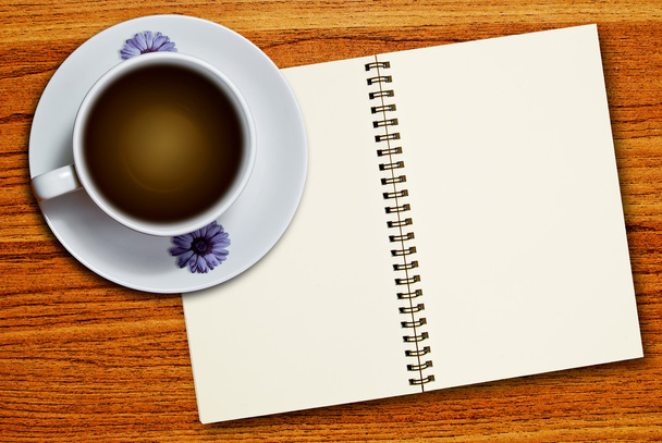 White cup of coffee and notebook - Фото, изображение