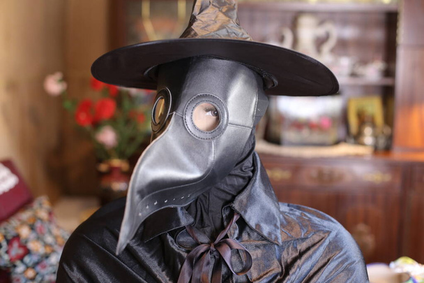 close-up portrait of doll with plague doctor mask at home, Halloween celebration concept - Photo, Image
