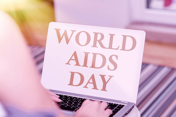 Kirjoitan tekstinäytöstä Maailman aids päivä. Käsitteellä tarkoitetaan kansainvälistä päivää, jolloin lisätään tietoisuutta aids-pandemian ääni- ja videopuheluvalmiuksista, jotka yhdistävät ihmisiä toisiinsa - Valokuva, kuva