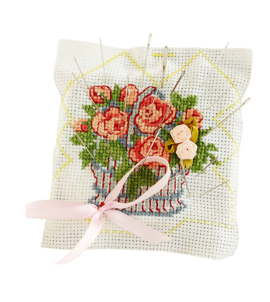 Embroidered pillow with the needles on the white - Photo, Image