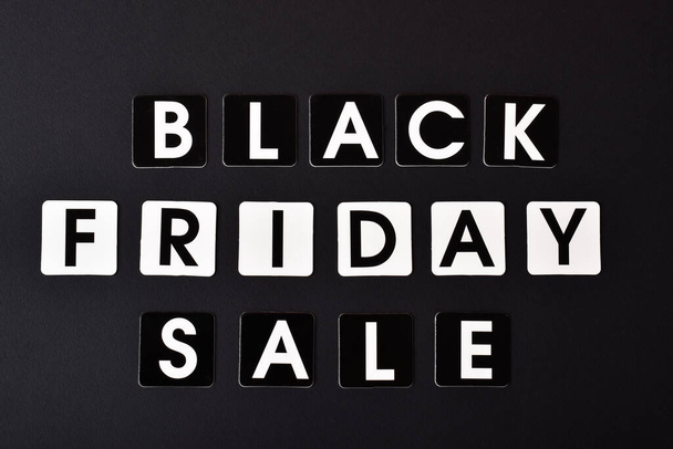 On a black background, the inscription black Friday sale. Flat layout, top view, a place to copy. - Photo, Image