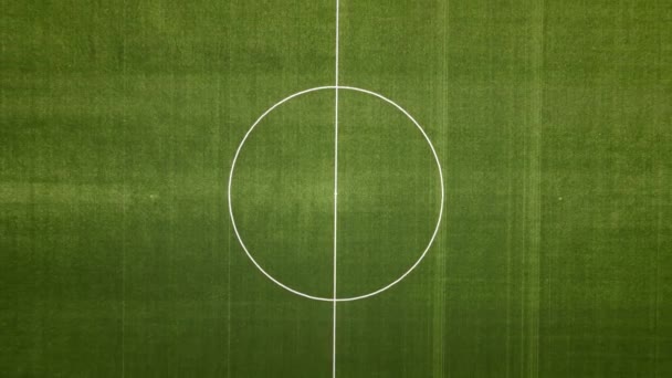 Luftaufnahme des Fußballfeldes und des Stadionlaufbands - Filmmaterial, Video