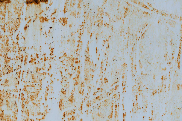 Rust stains. Rusted painted metal wall. Rusty metal background with streaks of rust. Corroded metal background. - Foto, Imagem