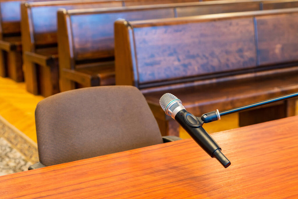 Closeup of microphone in the courthouse. Justice system, witness testimony. Nobody - Photo, Image