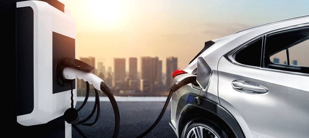 グリーンエネルギーとエコパワーをコンセプトとした電気自動車用EV充電ステーション - 写真・画像