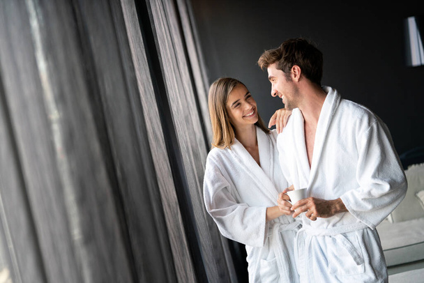 Handsome man and beautiful woman relaxing in spa, hotel - Φωτογραφία, εικόνα