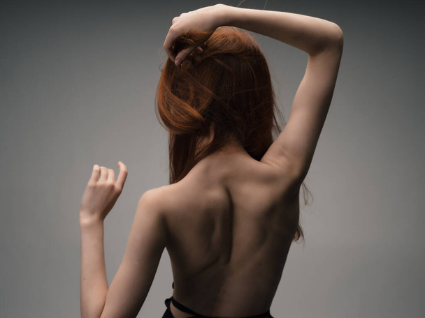 redhead woman nude back posing clean skin studio - Photo, Image