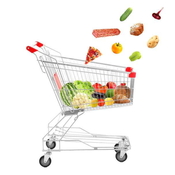 Full shopping trolley, isolated on white - Foto, immagini