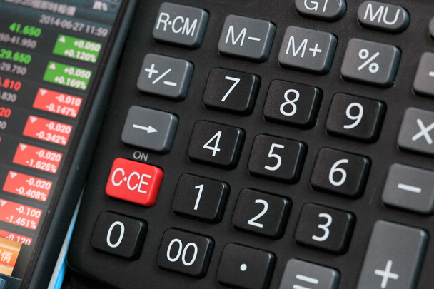 Kalkulačka postavena vedle sebe proti indexu - Fotografie, Obrázek