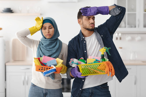 Tired muslim family after cleaning their new apartment - Photo, Image