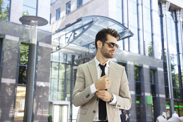 Businessman in front of business center - Photo, Image