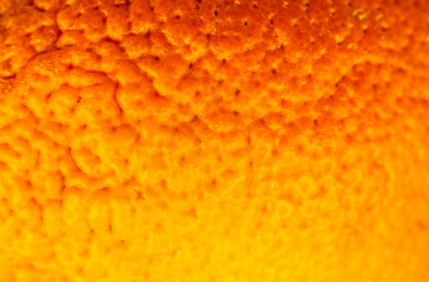 Zavřít fotografii textury pomerančové kůry. Pomeranče zralé ovoce pozadí, makro pohled - Fotografie, Obrázek