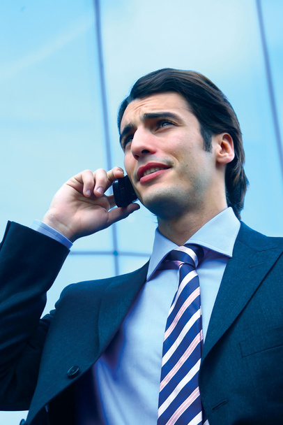 a businessman using mobile phone b - Foto, imagen