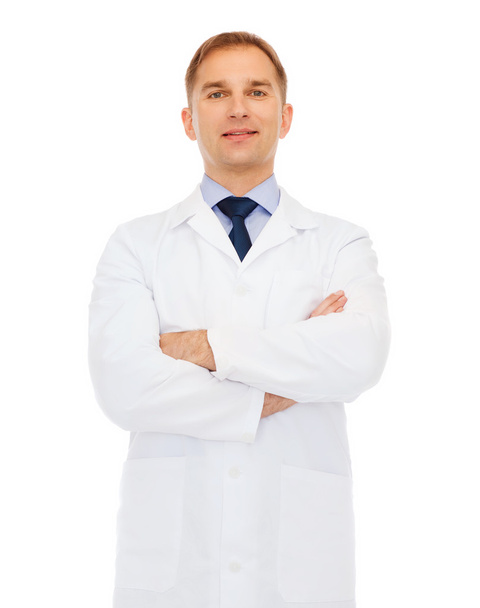 smiling male doctor in white coat - Photo, image