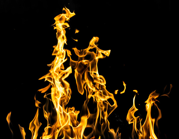 Fire on a black background - Foto, afbeelding