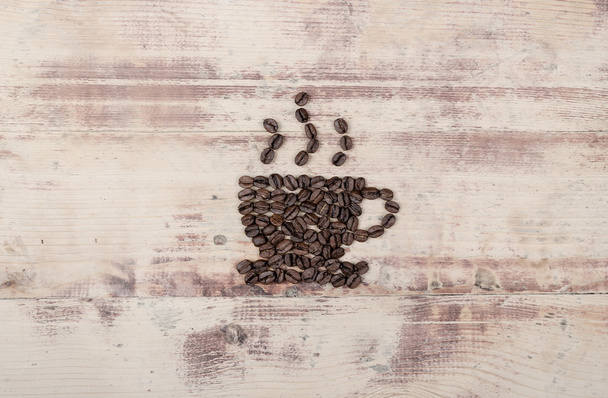 コーヒー豆の小さなカップ - 写真・画像
