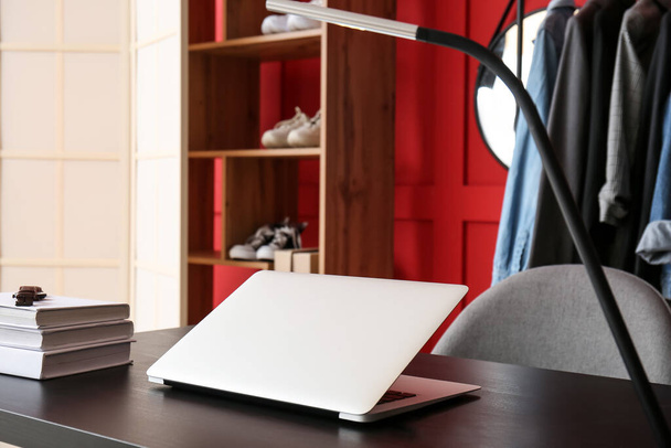 Modern laptop on table in stylish room - Фото, зображення