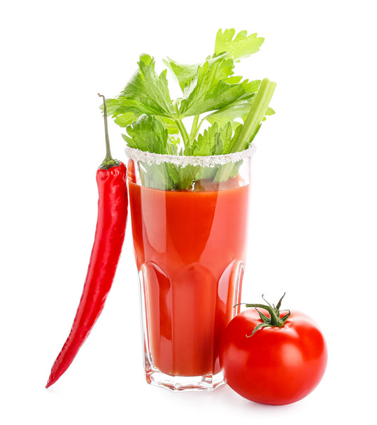 Glass of bloody mary cocktail garnished with cilantro, red chili pepper and tomato on white background - Photo, Image