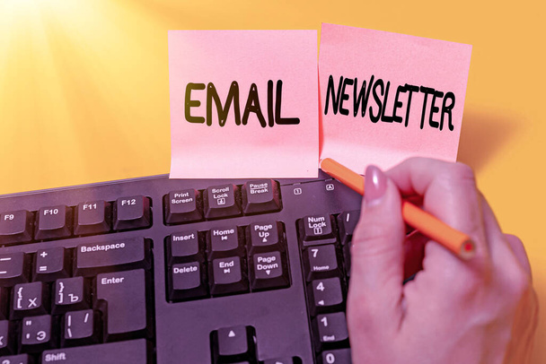 Handwriting text Email Newsletter. Business approach email sent out to inform the audience of the latest news Hands pointing pressing computer keyboard keys typewriting new ideas. - Foto, imagen