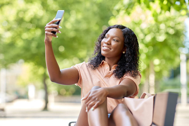 african student girl taking selfie with smartphone - Fotó, kép