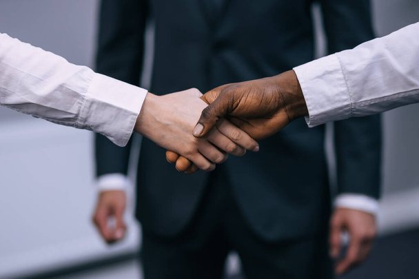 handshake of business partners after a favorable trade deal - Fotó, kép