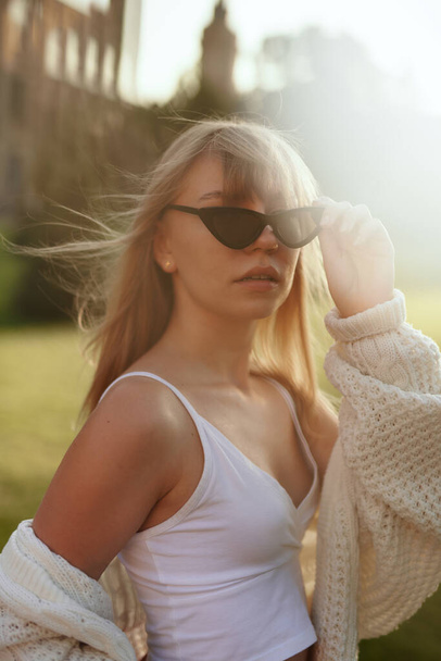 Fashionable young cute teen in sunglasses aesthetic portrait - Photo, Image