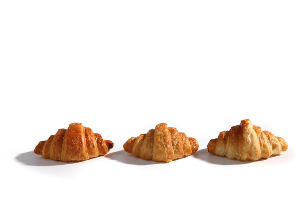 Croissant elszigetelt wihite háttér napsütéses fény  - Fotó, kép