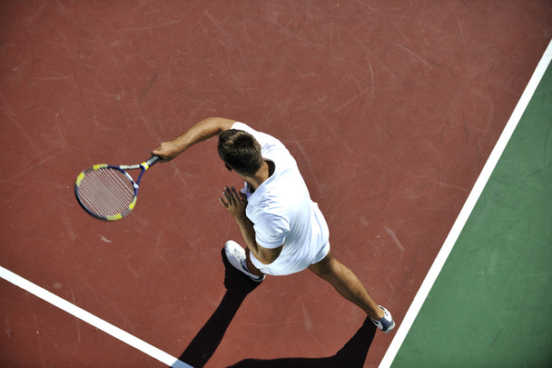 Young man play tennis - Фото, зображення