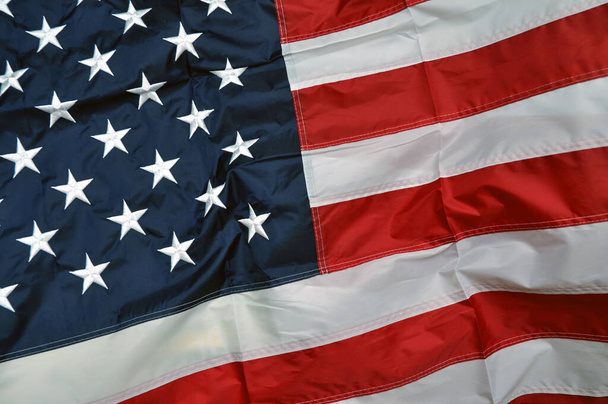United States of America flag. Fragment of fabric in the colors of the American flag. National. - 写真・画像