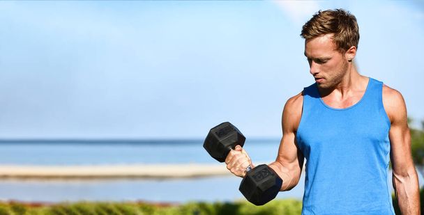 Fitness exercise fit man working out training muscles at gym doing bicep curls with free weight dumbbell banner. - Foto, Imagen