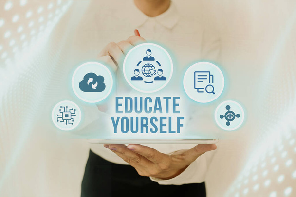 Conceptual display Educate Yourself. Word for To train or prepare oneself in a particular area or subject Lady In Uniform Standing Holding Tablet Typing Futuristic Technologies. - Photo, Image