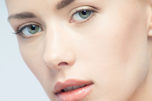 Closeup portrait of young beautiful green eyed woman - Φωτογραφία, εικόνα