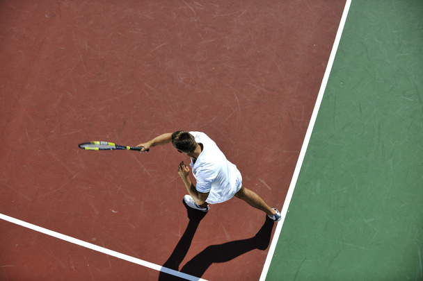 Young man play tennis - Фото, изображение