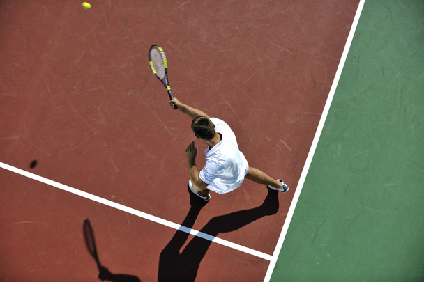 Young man play tennis - Фото, зображення