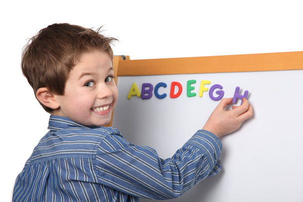 Cute young boy learning the ABC - Foto, Bild