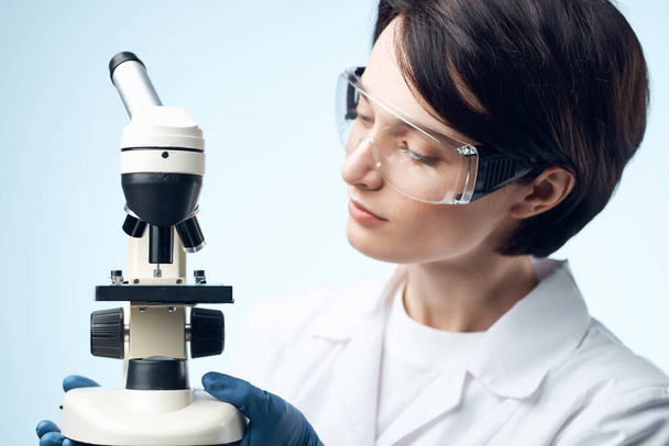 woman scientist chemical solution magnifier research - Foto, Imagen