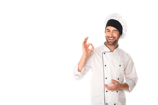 Positive chef showing ok gesture isolated on white  - Φωτογραφία, εικόνα
