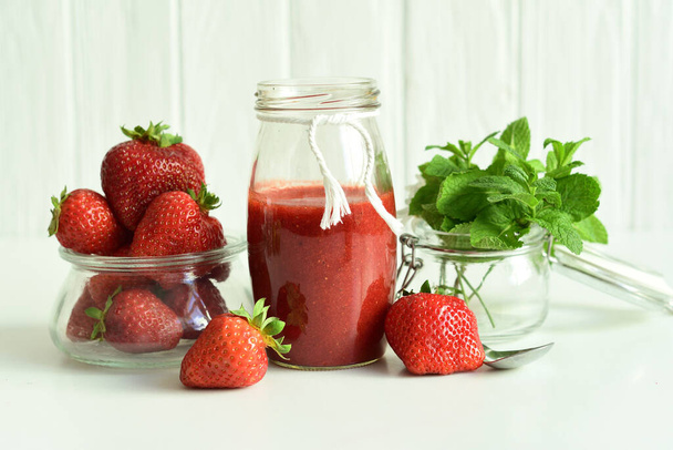 strawberry jam in a glass jar.Summer mood. Copy cpase. selective focus - Photo, Image