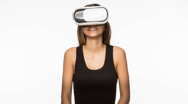 young woman with virtual reality goggles on white background - Photo, Image