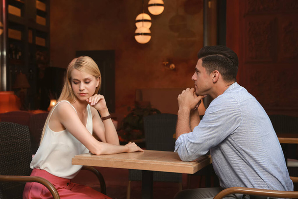 Bored couple having unsuccessful date in cafe - Foto, immagini