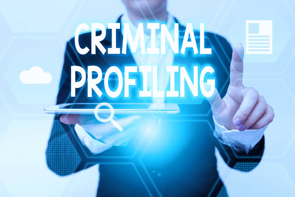 Writing displaying text Criminal Profiling. Word for Develop profiles for criminals who not yet apprehended Woman In Suit Holding Tablet Pointing Finger On Futuristic Virtual Button. - Photo, Image
